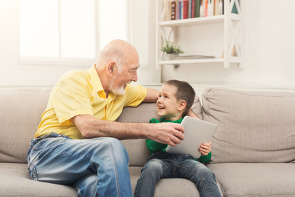 Senior & Child with Tablet