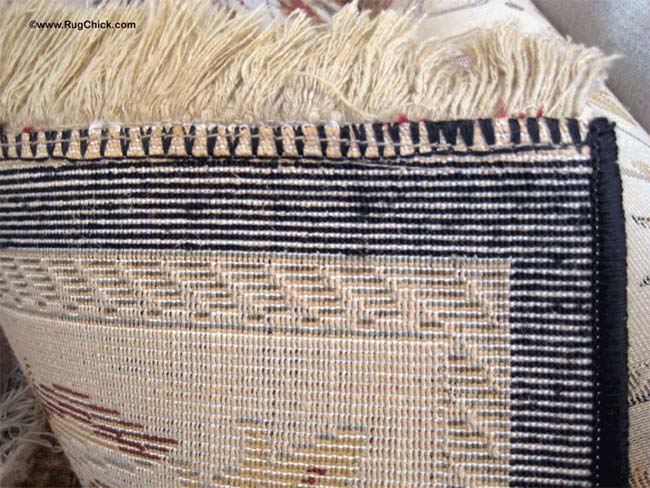 Back of Synthetic Rug With Thick Beige Jute Wefts (side to side cords)