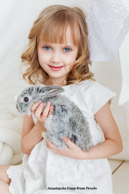 Child with Pet Rabbit