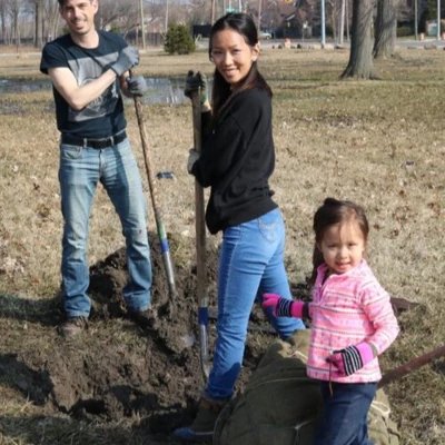 Family Planting Trees