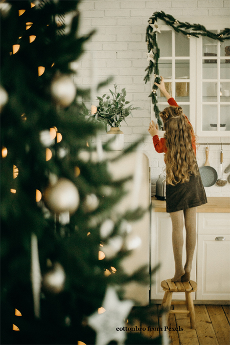 Child Helping with Decorations