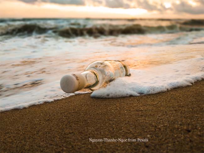 Glass Bottle on Beach