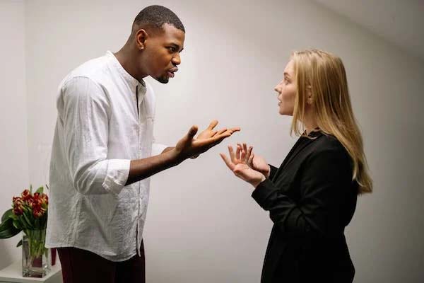 Man and Women Discussing