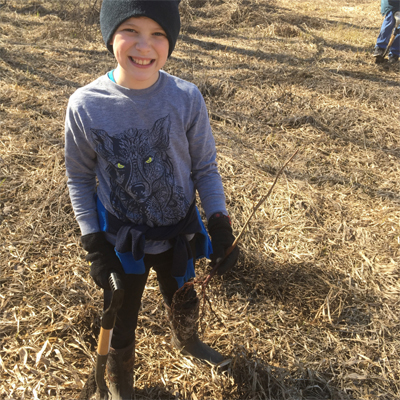 Boy Planting Trees