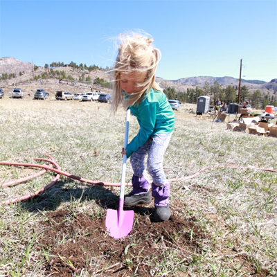 Child Planting Tree